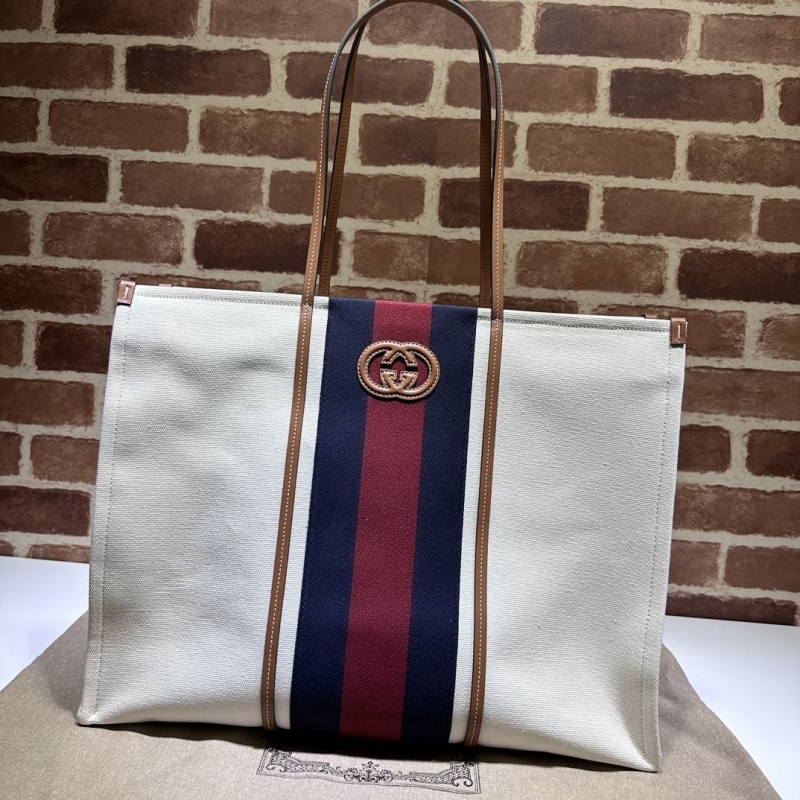 G*u*i shopping bags